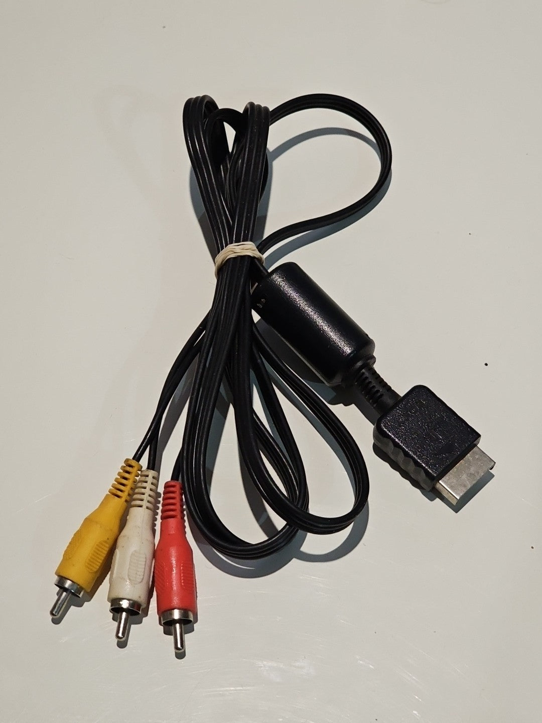 Display Cable For Playstation 1 + 2 + 3 Composite Connection Display Cable Black cap/hat front (Image 1) — Second-Hand