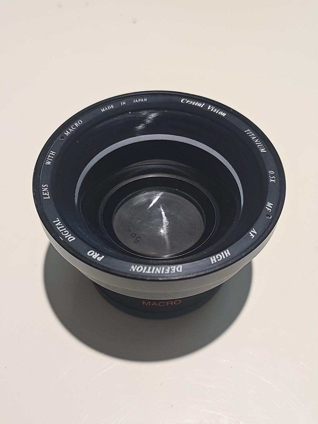 Crystal Vision 0.5X MF AF High Definition Digital Lens With Macro device front (Image 1) — Second-Hand