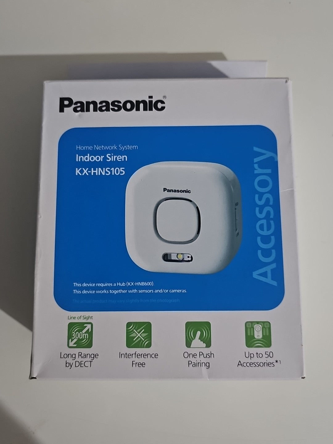 Panasonic KX-HNS105 Smart Home Indoor Siren cap/hat front (Image 1) — Second-Hand
