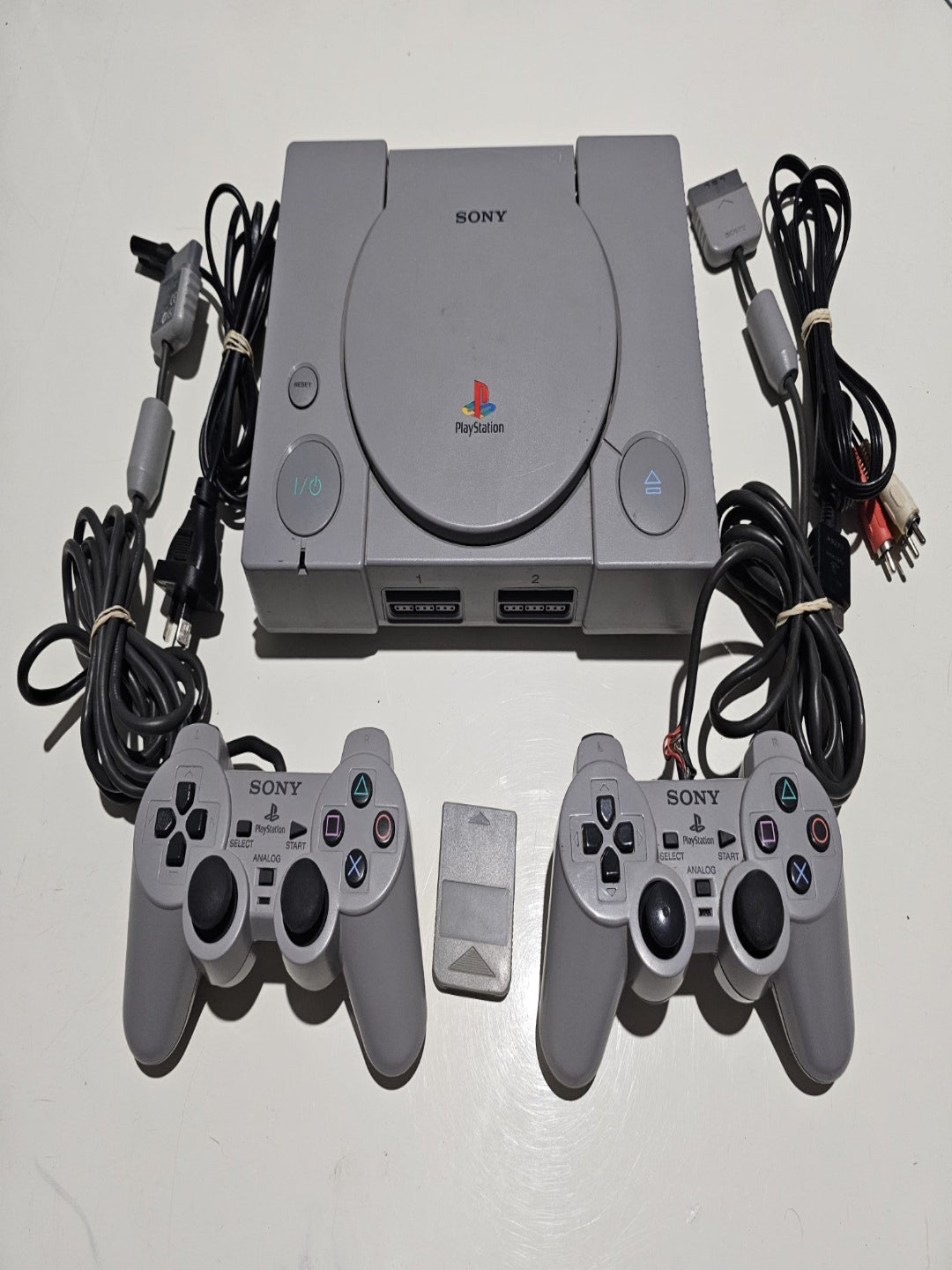 Sony playstation 1 console with 2 Controllers & PS1 Memory Card Tested Working controller front (Image 1) — Second-Hand