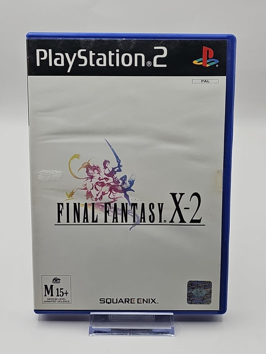 FINAL FANTASY X-2 PS2 PlayStation 2 With Manual PAL cap/hat front (Image 1) — Second-Hand