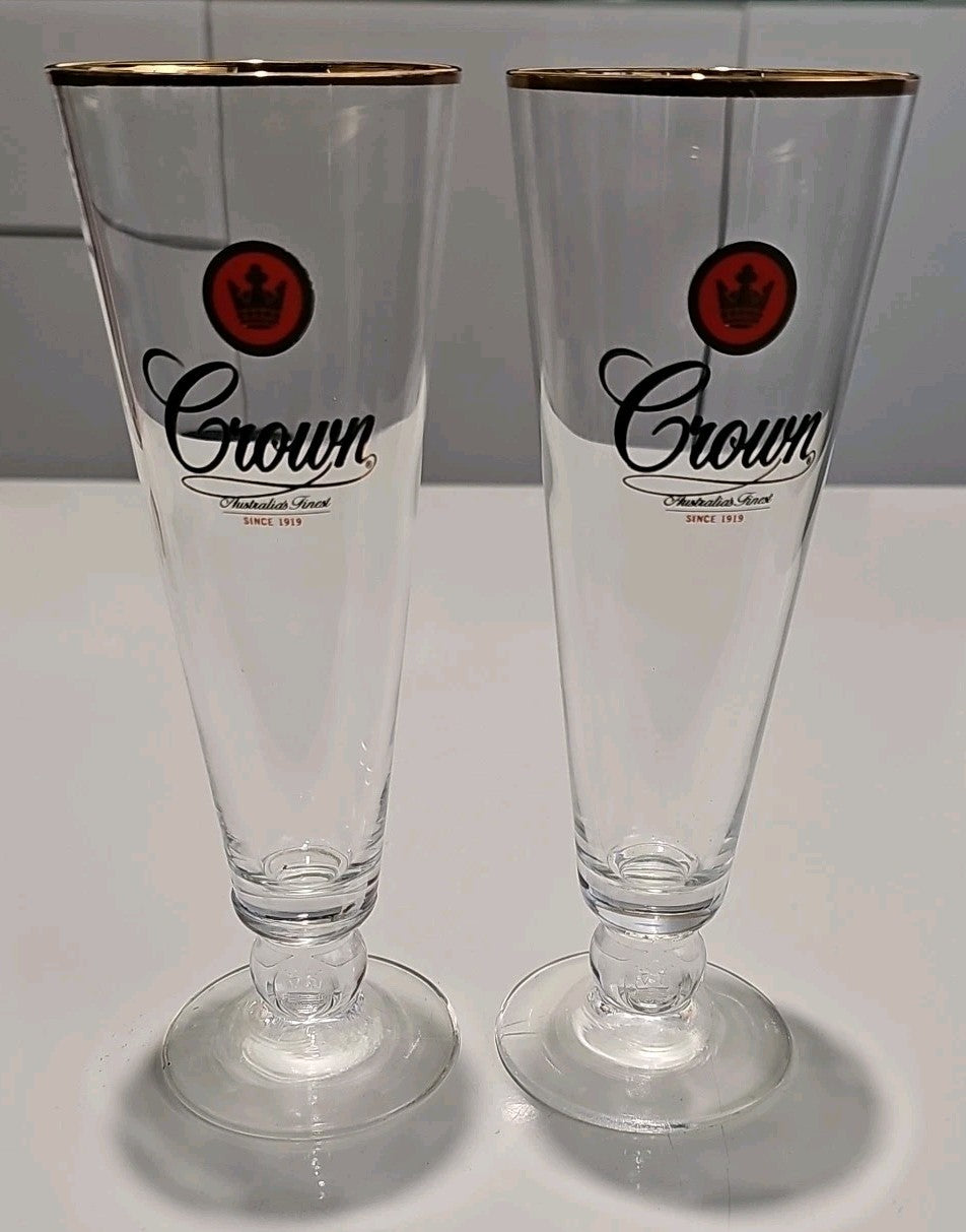 Lot of 2 Crown Lager Footed Tall Glass Gold Rim 300ml VGC Collector Bar Glasses product photo (Image 1) — Second-Hand
