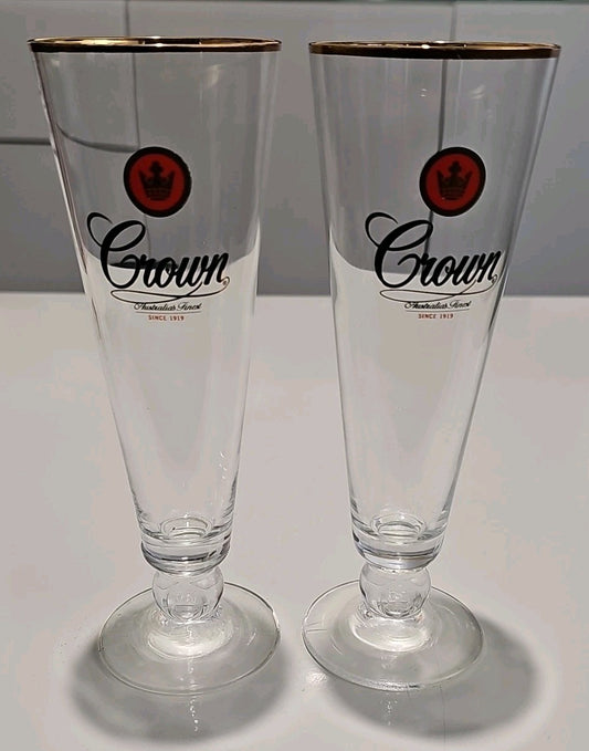 Lot of 2 Crown Lager Footed Tall Glass Gold Rim 300ml VGC Collector Bar Glasses product photo (Image 1) — Second-Hand