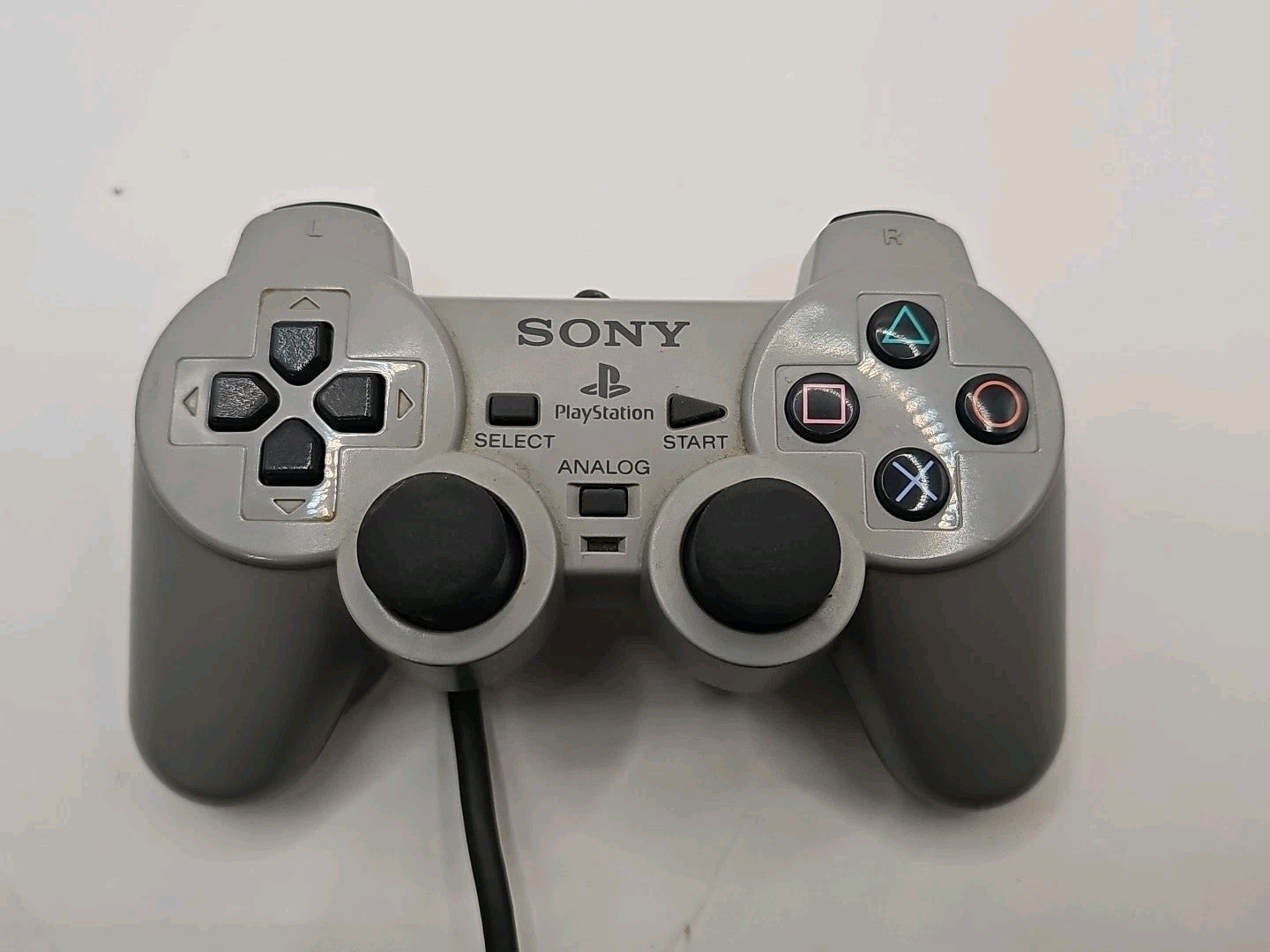 Genuine Playstation 1 Controller Ps1 PsOne Controller controller front (Image 1) — Second-Hand