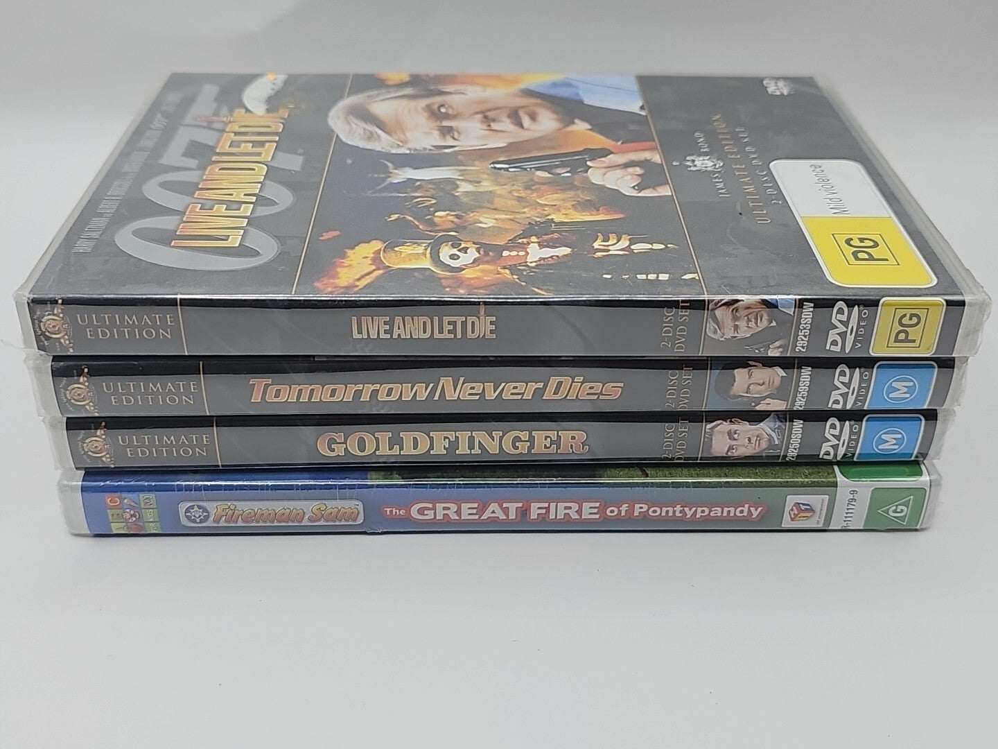 Random *Sealed* Dvd Bundle 4 Dvds James Bond + Fireman Sam Dvd case (Image 1) — Brand New (Sealed or Like New)