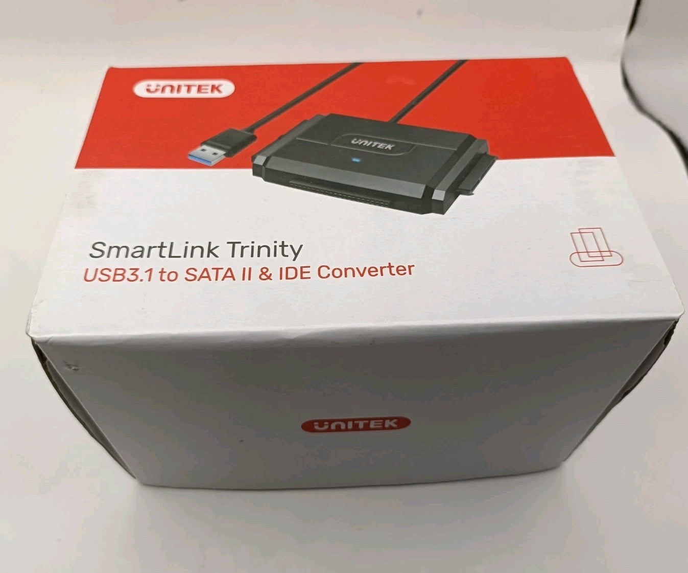 United Smart link Trinity. Used. USB 3.1 To SATA II & IDE Converter. cap/hat front (Image 1) — Second-Hand