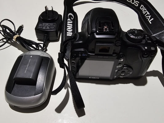 CANON EOS Digital X DS126151 Zoom Lens With Battery And Charger (Read Desc) device front (Image 1) — Second-Hand