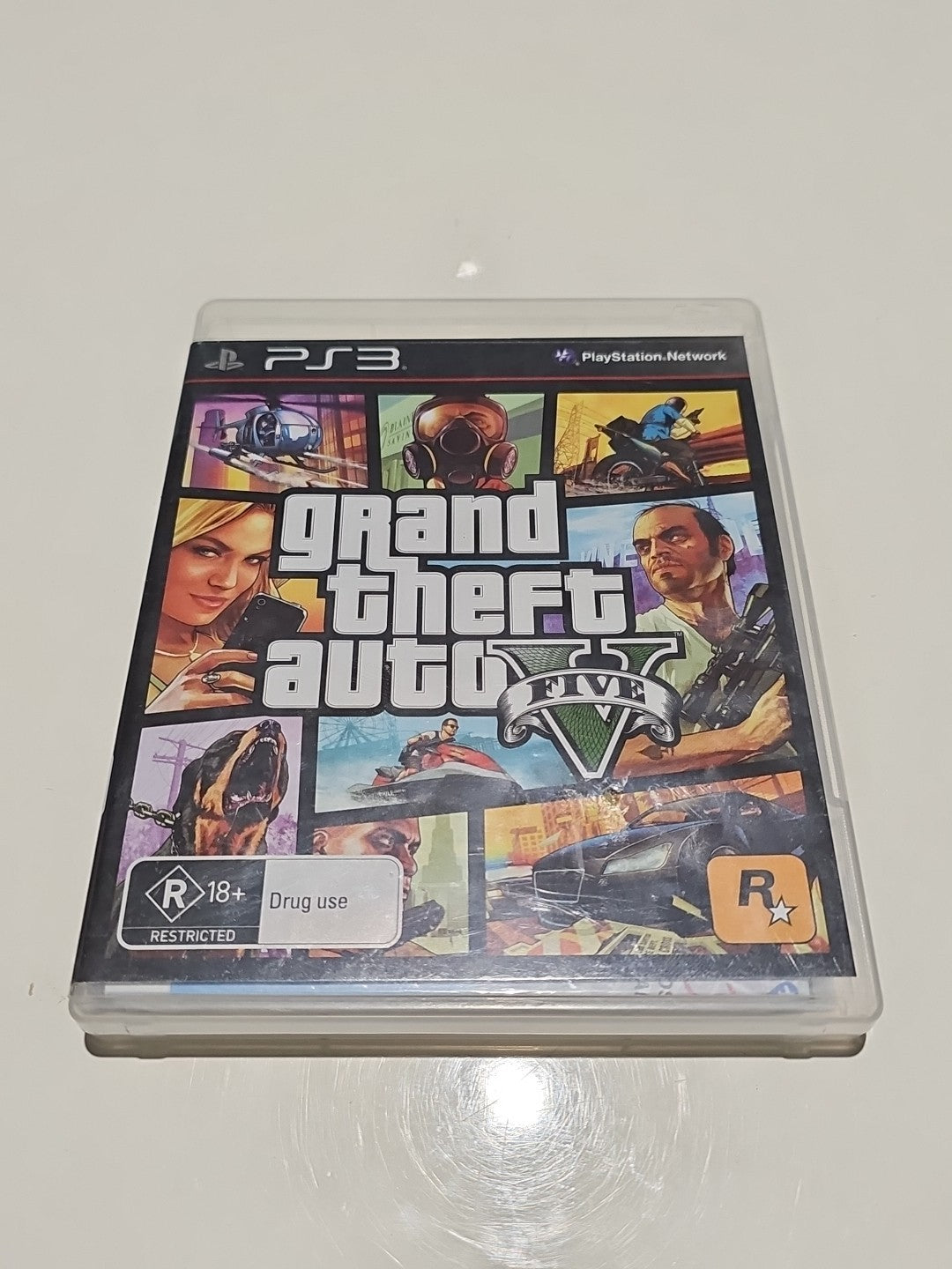 PS3 Grand Theft Auto V 5 Sony PlayStation 3 Game With Manual and MAP PS3 cover photo (Image 1) — Second-Hand