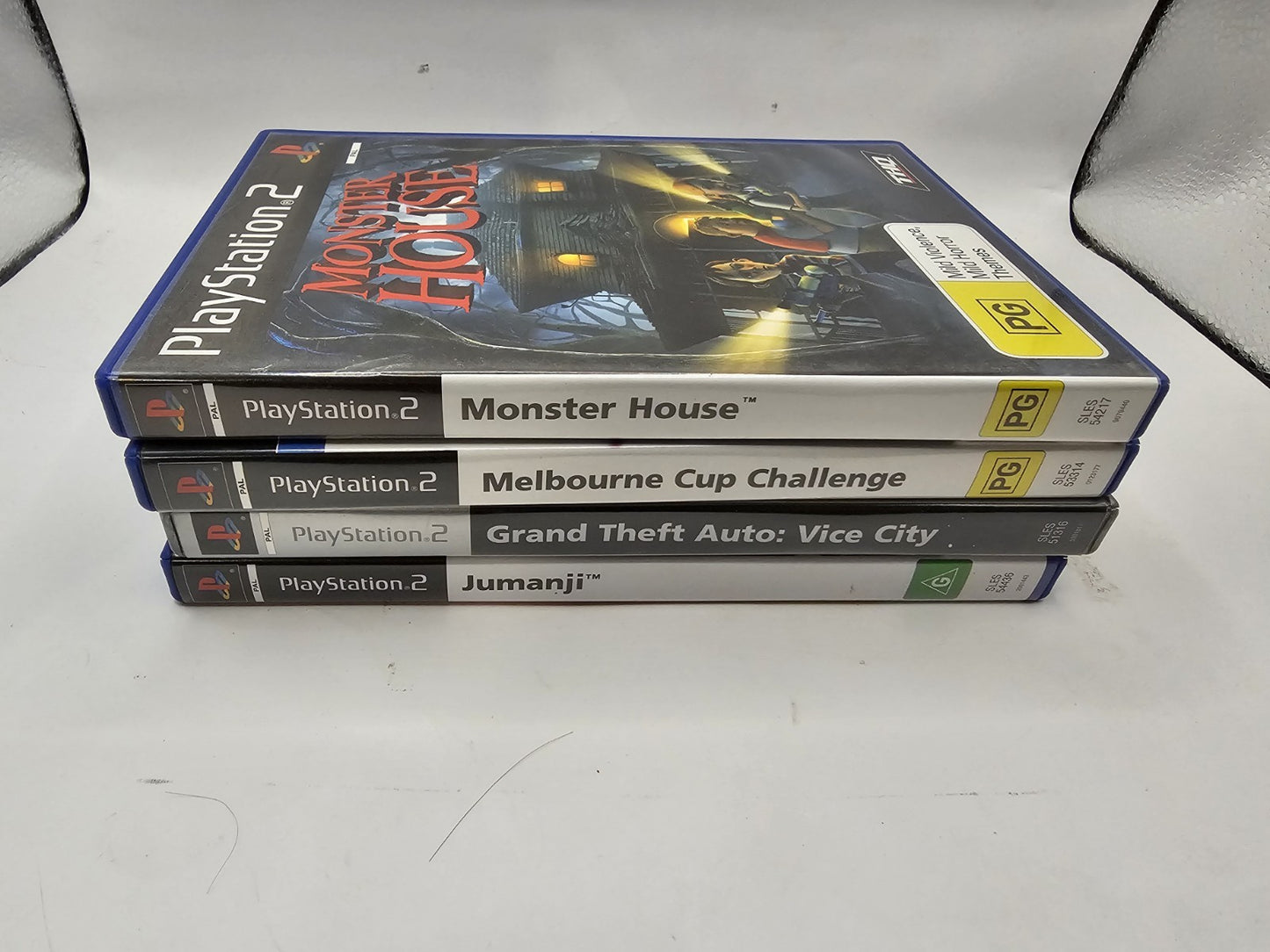 PlayStation 2 Random Games Bundle 4x Games #2 cap/hat front (Image 1) — Second-Hand