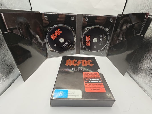 ACDC Plug Me In (2x DVD, 2007) - No Region - Complete - Good Condition Dvd case (Image 1) — Second-Hand