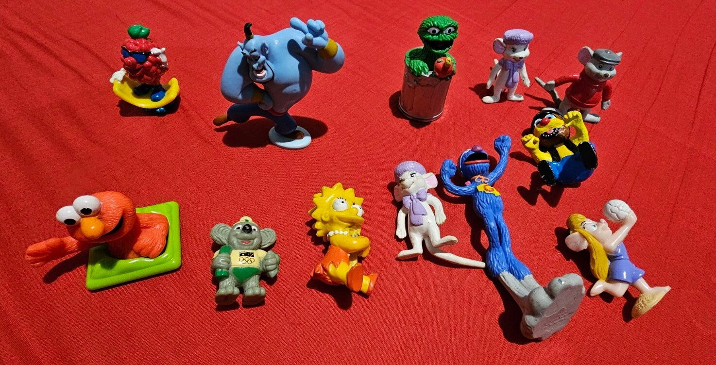 Rare 1990s Pvc Figure Bundle Disney,Simpsons,Alladin,Sesame Street figure front (Image 1) — Second-Hand
