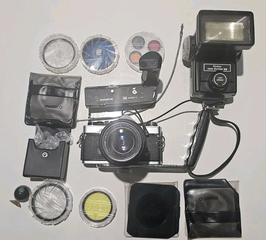 Vintage Olympus OM-1 Camera Black Body With Heaps of Accessories device front (Image 1) — Second-Hand
