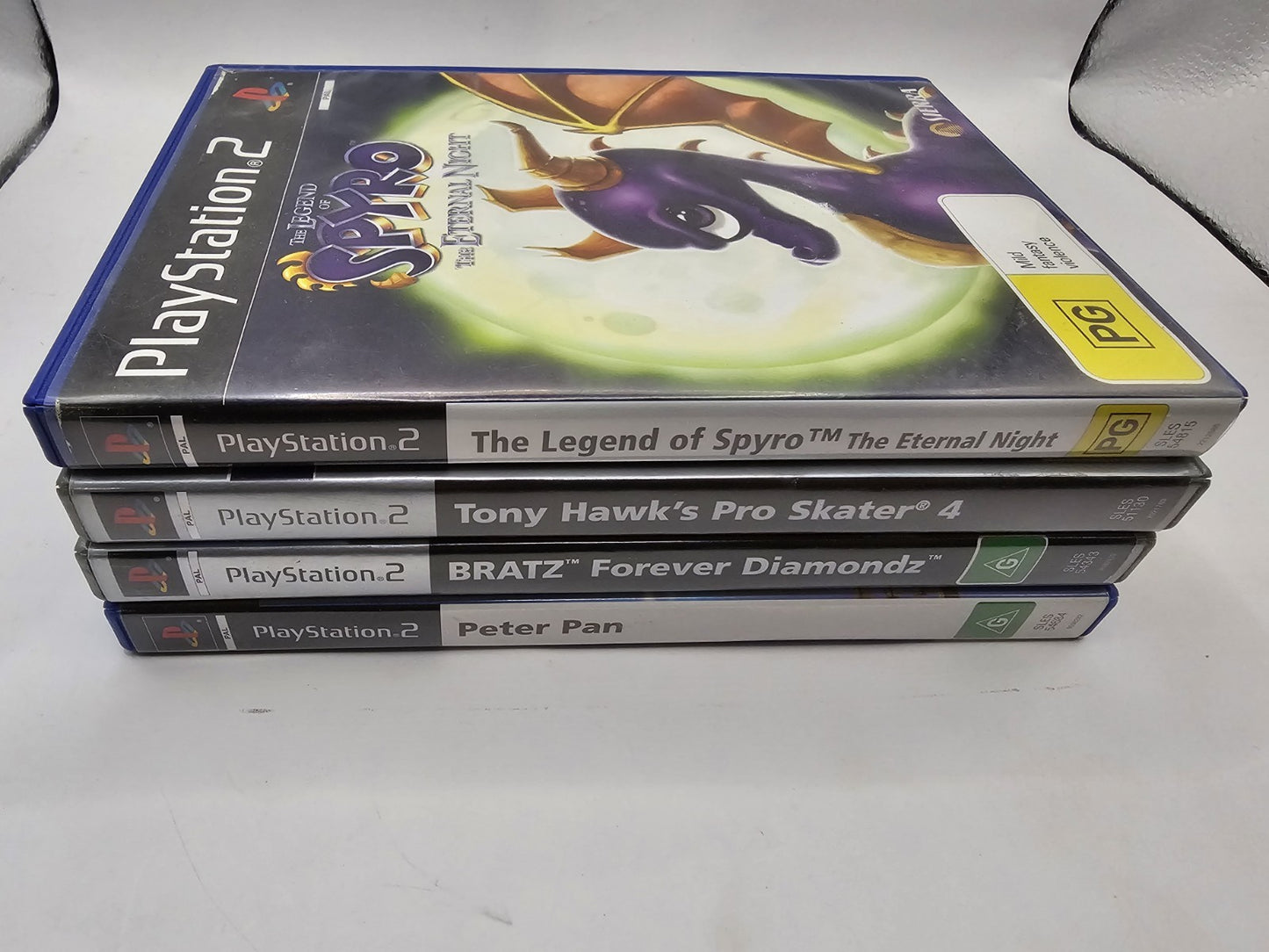 PlayStation 2 Random Games Bundle 4x Games #4 cap/hat front (Image 1) — Second-Hand