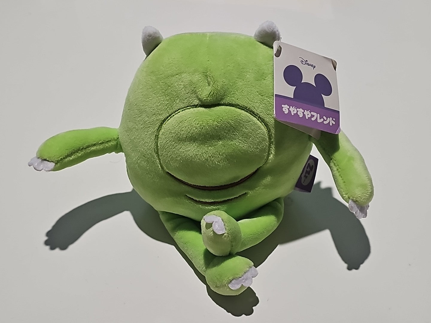 Disney Mike Wazowski Monster's Inc Plush Toy Sleeping Takara Tomy A.R.T.S cap/hat front (Image 1) — Second-Hand
