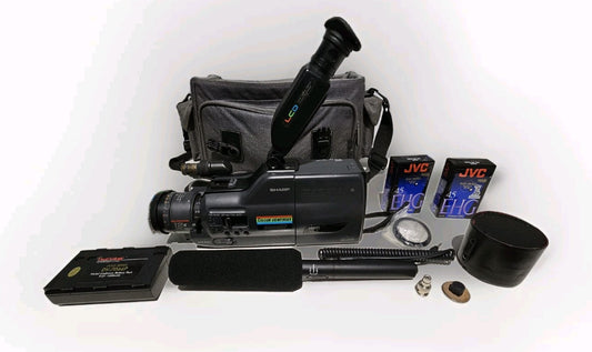 Sharp PAL VHS-C Camcorder with Color Viewfinder 12x Zoom VL-C7950x + Acessories Vhs case (Image 1) — Second-Hand