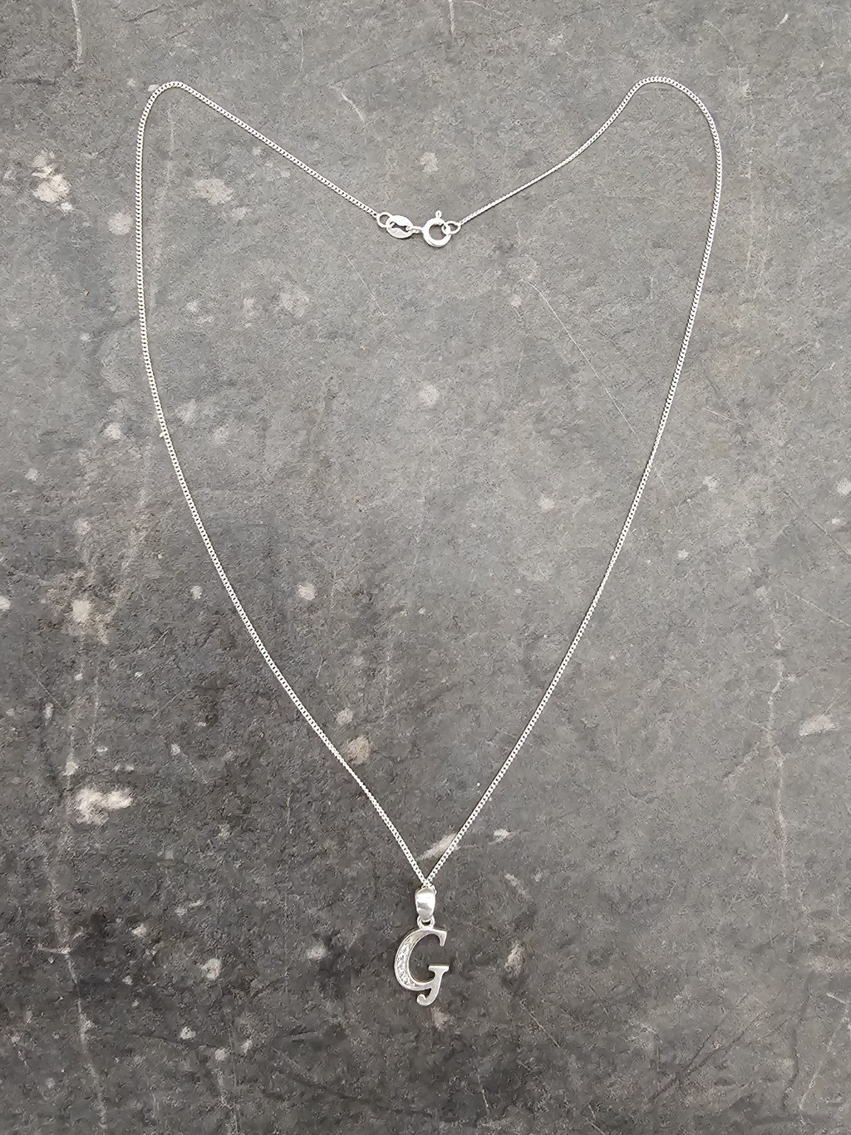 Sterling Silver 925 Marked G Pendant With Sparkly Stone 45 Cm cap/hat front (Image 1) — Second-Hand